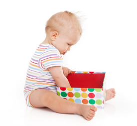 baby with cardboard box