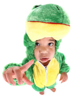 Toddler in dinosaur costume